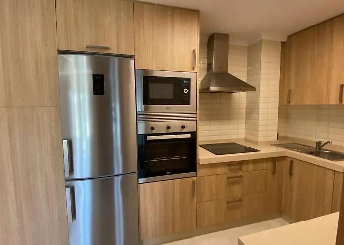 Coqueto apartamento cerca de la playa con parking Baiona